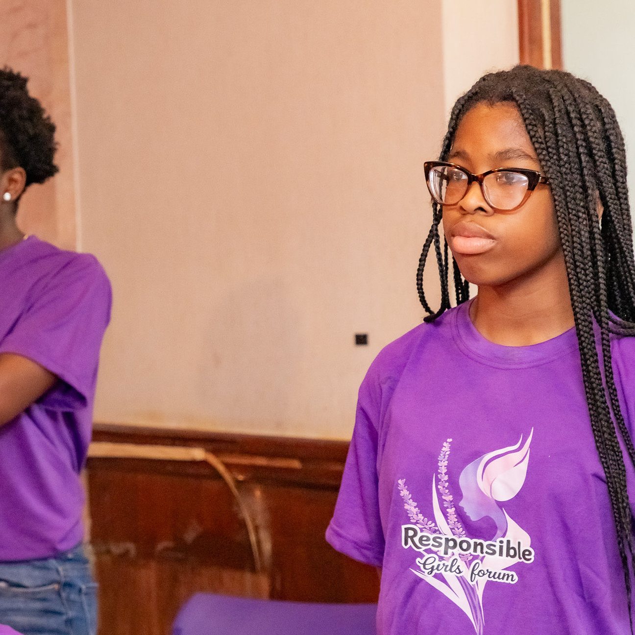 Girls in Responsible Girls Forum shirts during a session